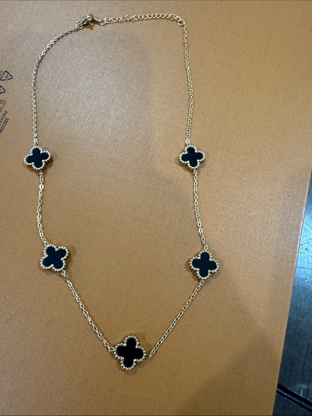 Gold-Tone Necklace with Black Clover Motifs